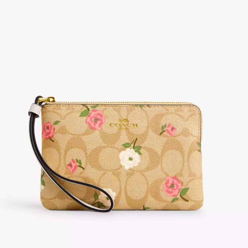 New with tag Coach Corner Zip Wristlet In Signature Canvas With Floral